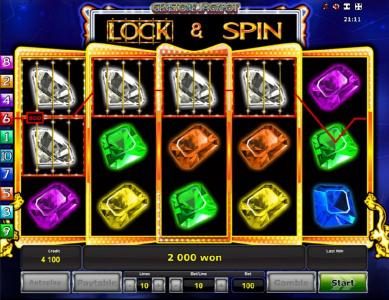 Lock and spin feature triggers multiple winning paylines and a 2000 coin payout.