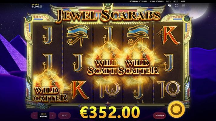 Jewel Scarabs :: Scatter symbols triggers the free spins feature
